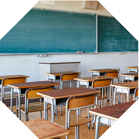 Classroom with desks and a chalkboard