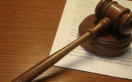 Gavel on top of papers