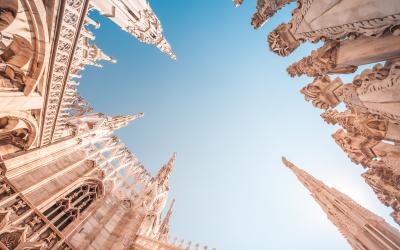 View of Gothic architecture and art on the roof of Milan Cathedral (Duomo di Milano), Italy.