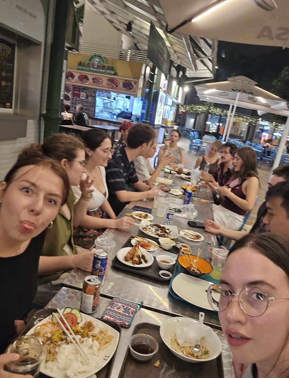 A group of uo students catching some dinner in Singapore