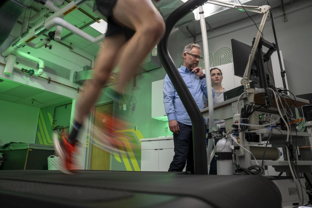 low angle photo of person running on a treadmill