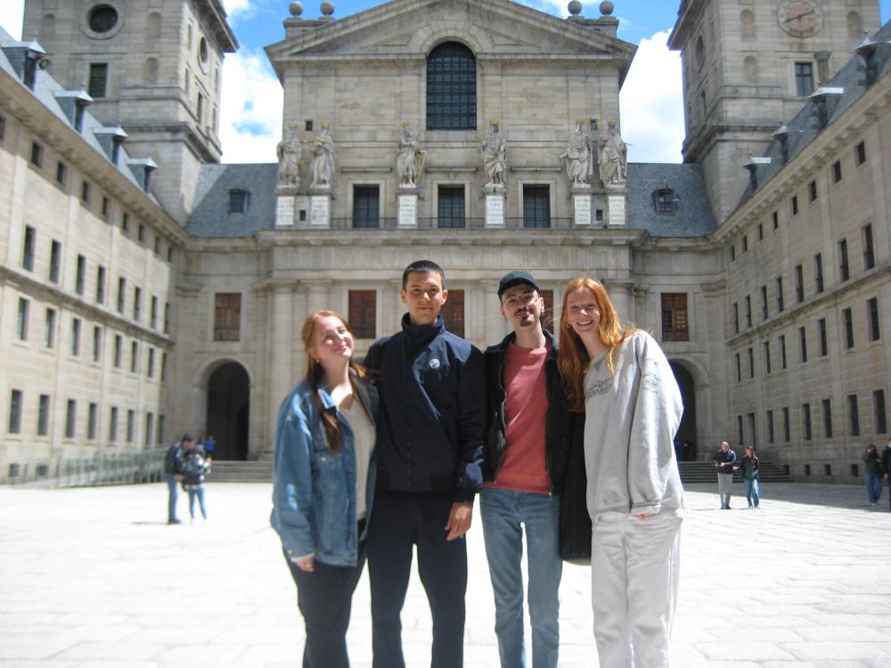 Group of students posing in front of a plaza in Madrid