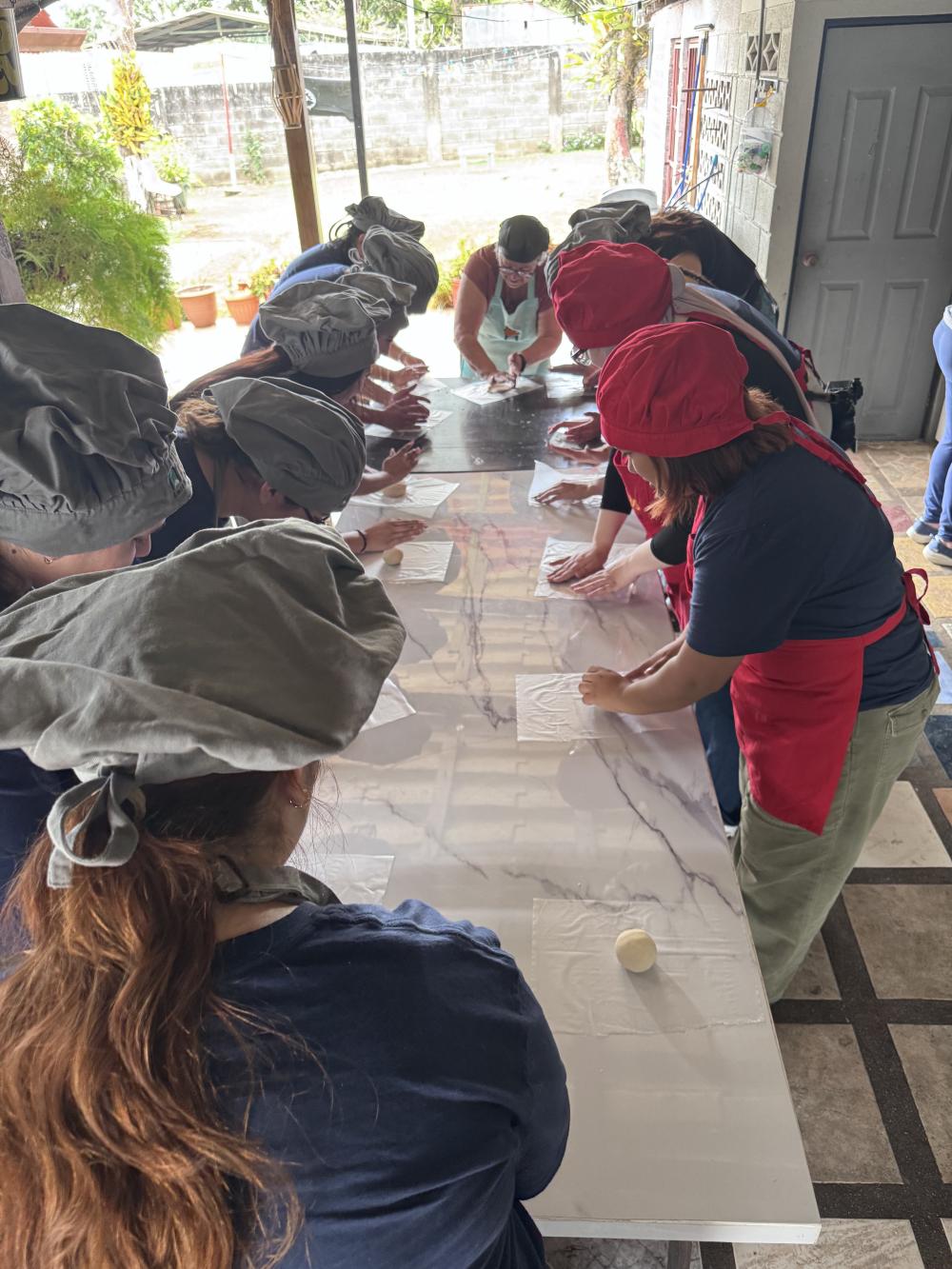 friends cooking in costa rica