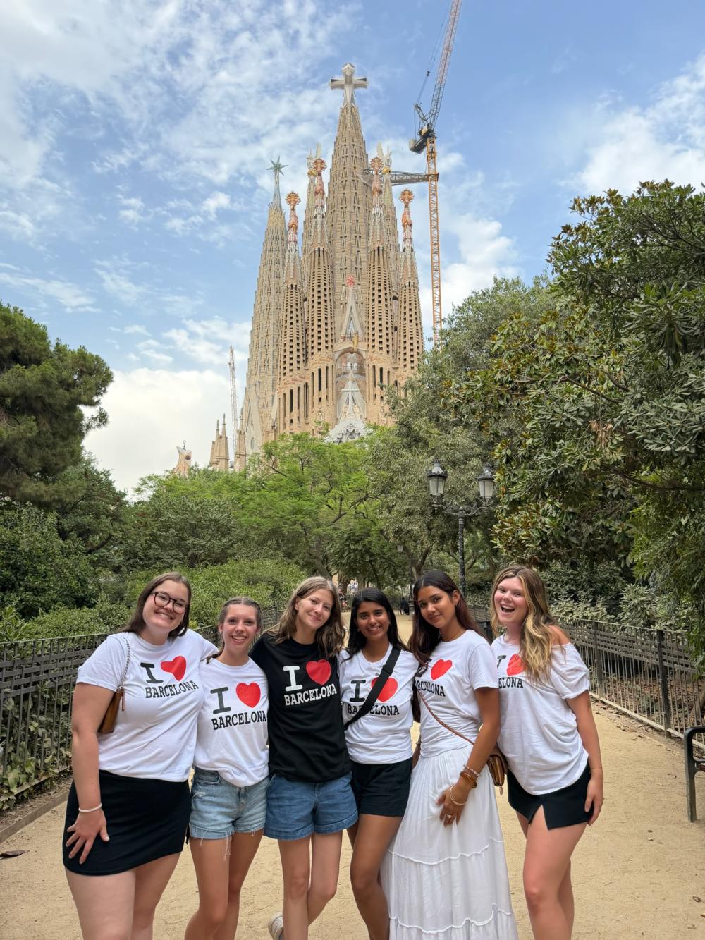 a group of uo students standing in front of la Sagrada Familia