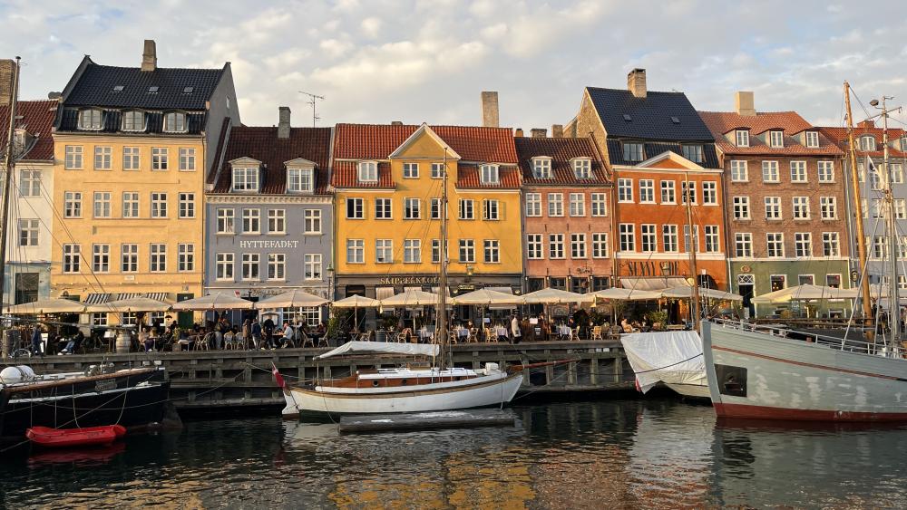 Line of colorful buildings in Copenhagen along the waterfront.
