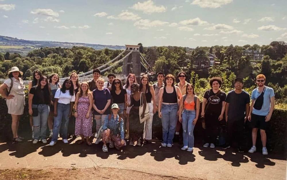 Cohort of GEO students smiling for a photo on a hike in London