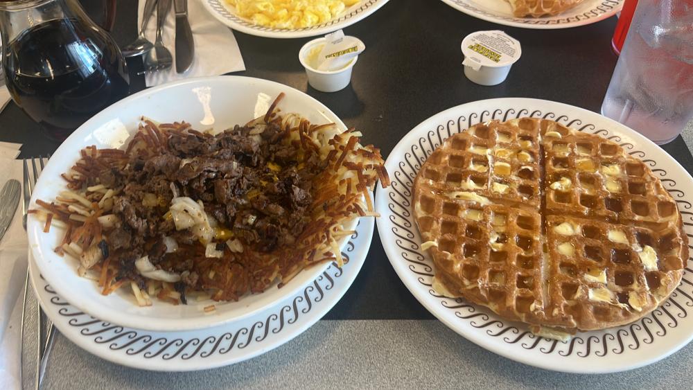 Plate of hash brown scramble and a waffle
