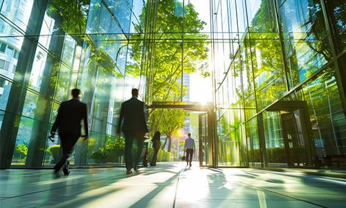 crowds of business people walking at a corporate office in a green city downtown
