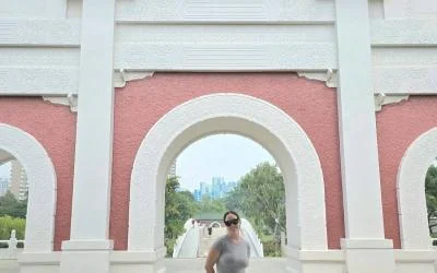 A uo student posing in Singapore