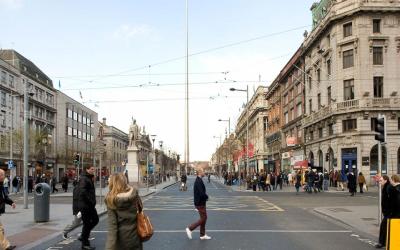  Street view of pedestrians crossing in Dublin.
