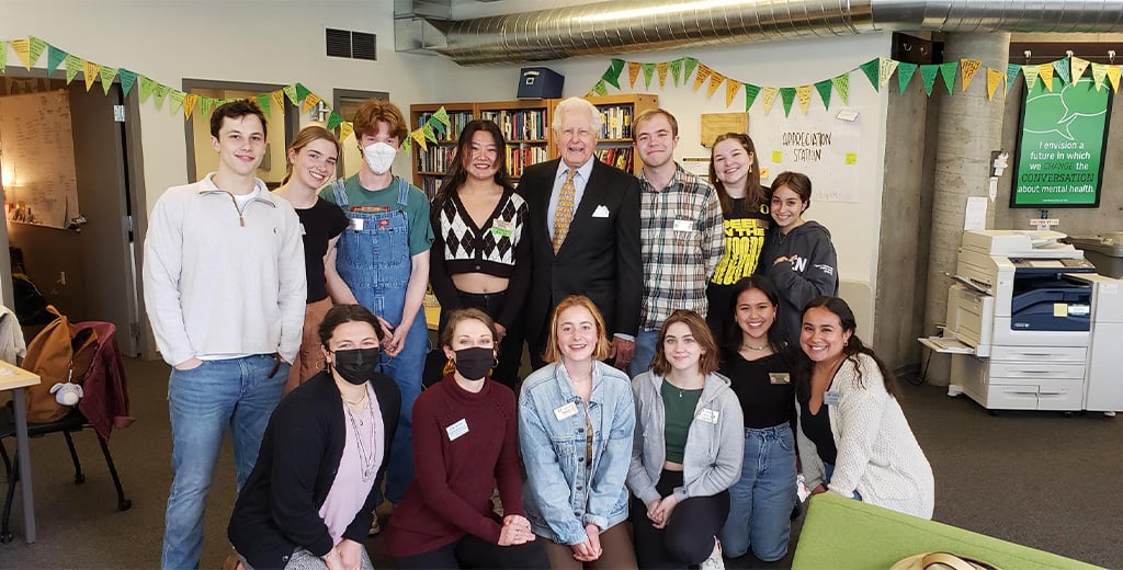 Ambassador Glen Holden with group of students during visit