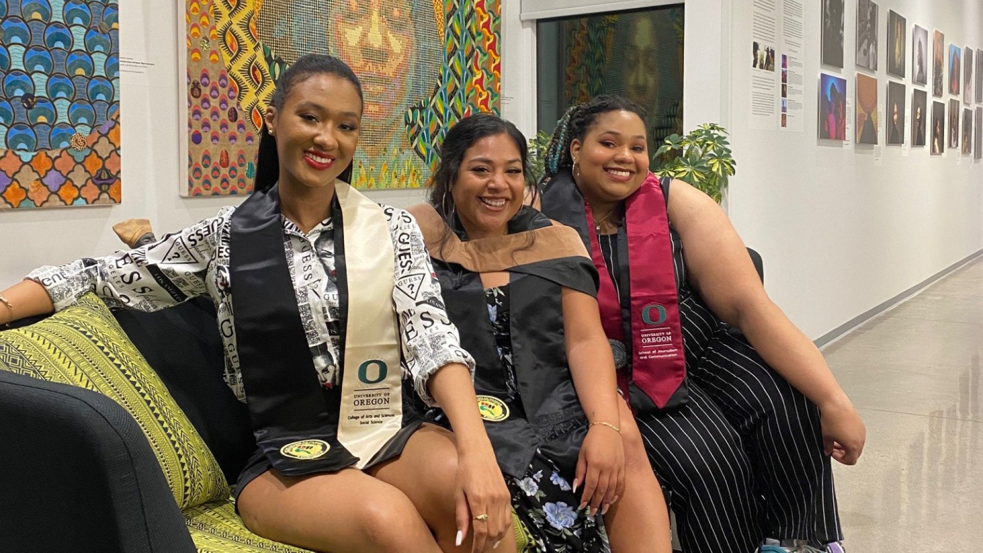 Three women sitting in the Black Cultural Center.