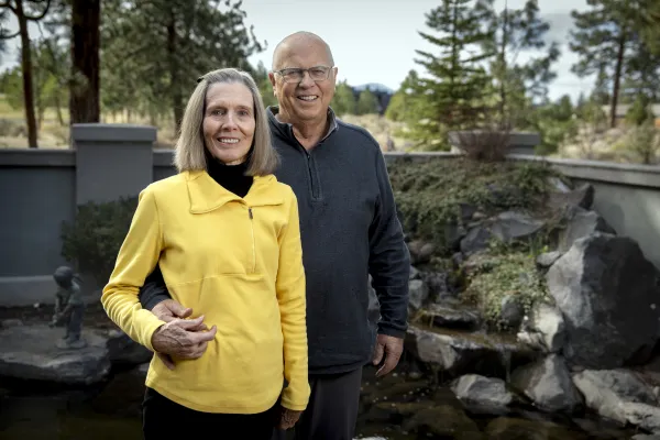 Nancy and Don Smith smiling outside