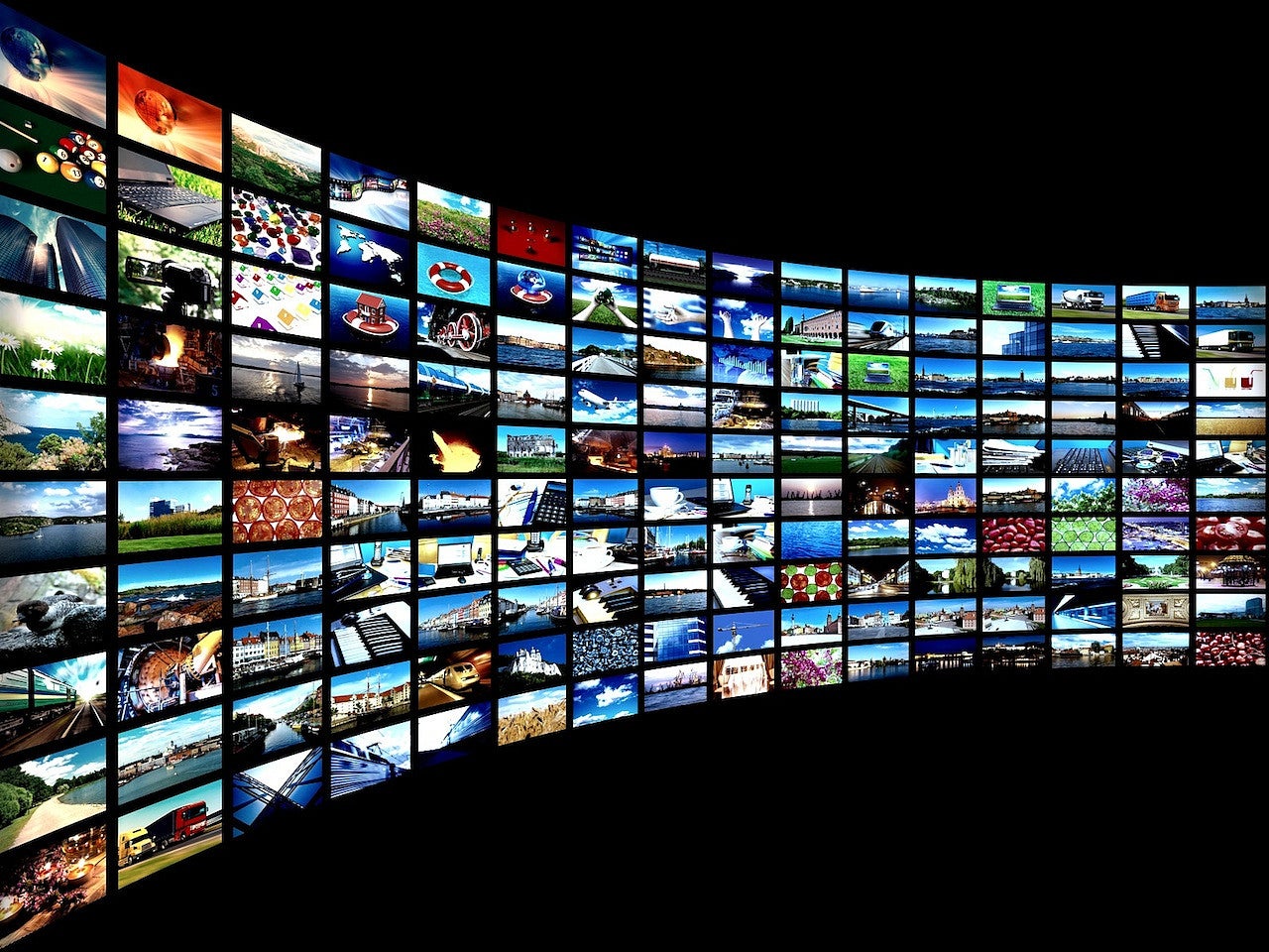 This image shows many tv screens displayed together, with each displaying distinct images