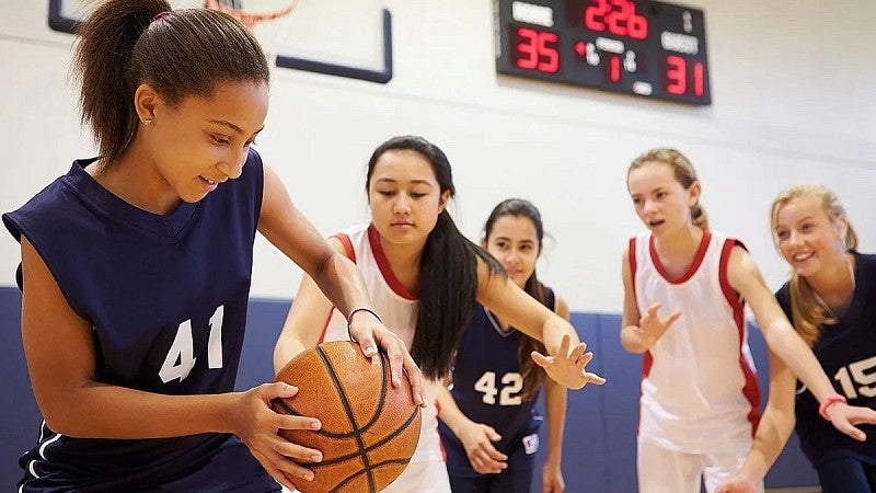 children playing basketball