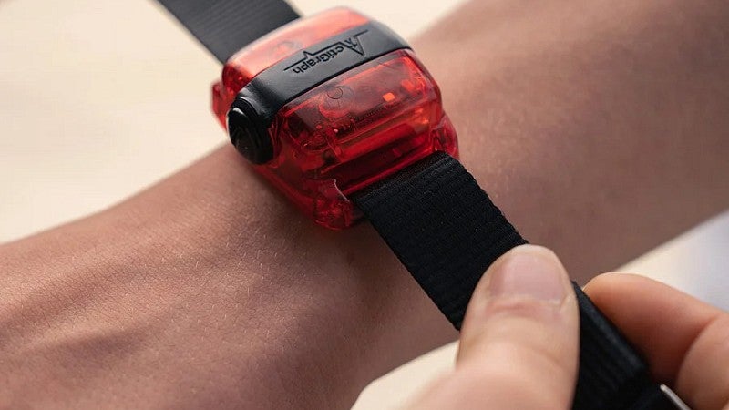 Naturedose device being attached to a person's wrist