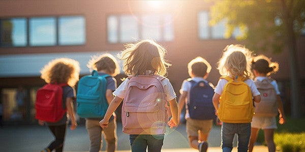 students walking into school