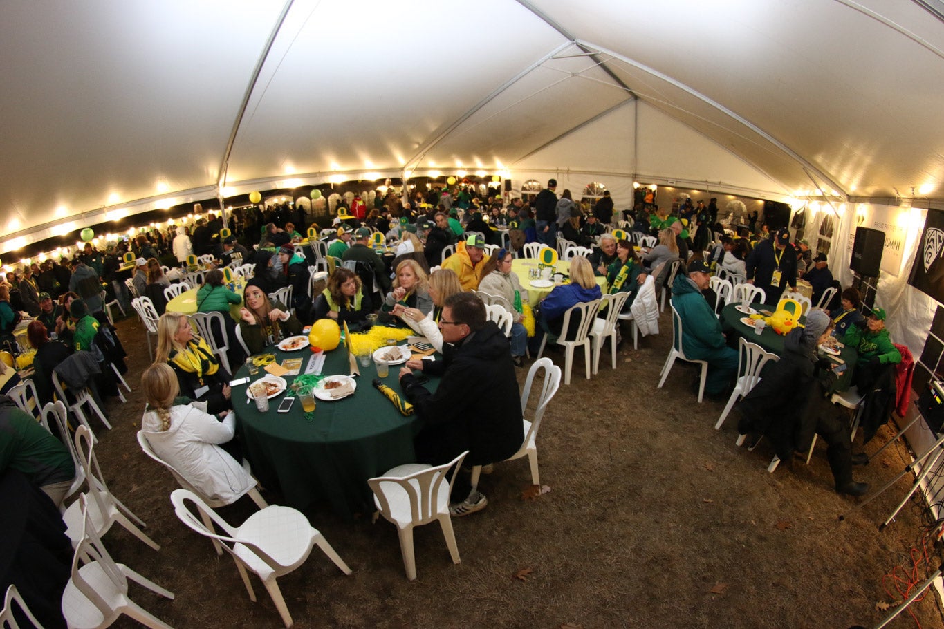 Parents and students enjoy food at the tailgate