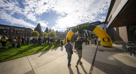Fans walk toward the Homecoming Pep Rally