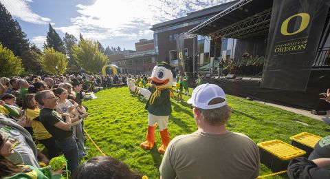 The Duck takes his own selfie with a fan's cell phone