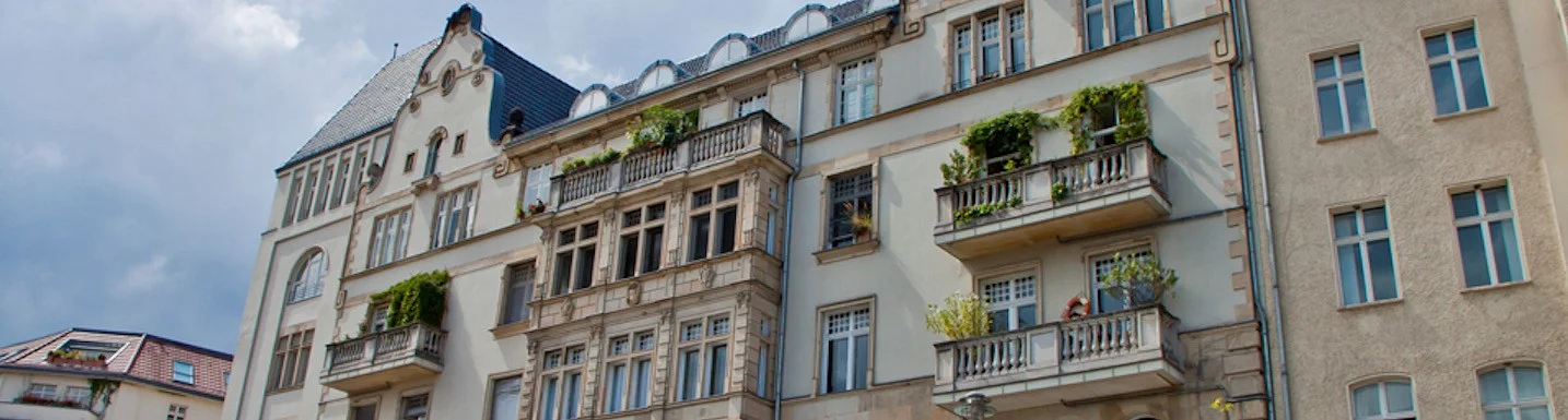 Residential building with ornate European-style facade.