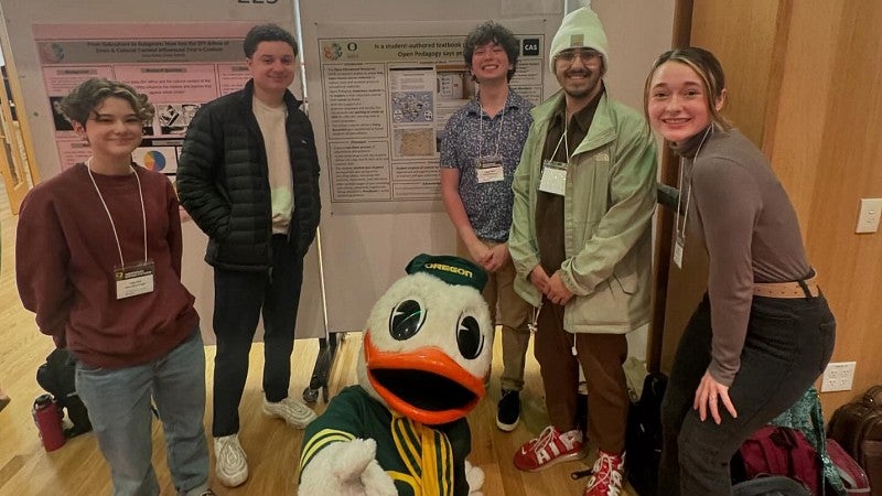 students at undergraduate research symposium with the Duck