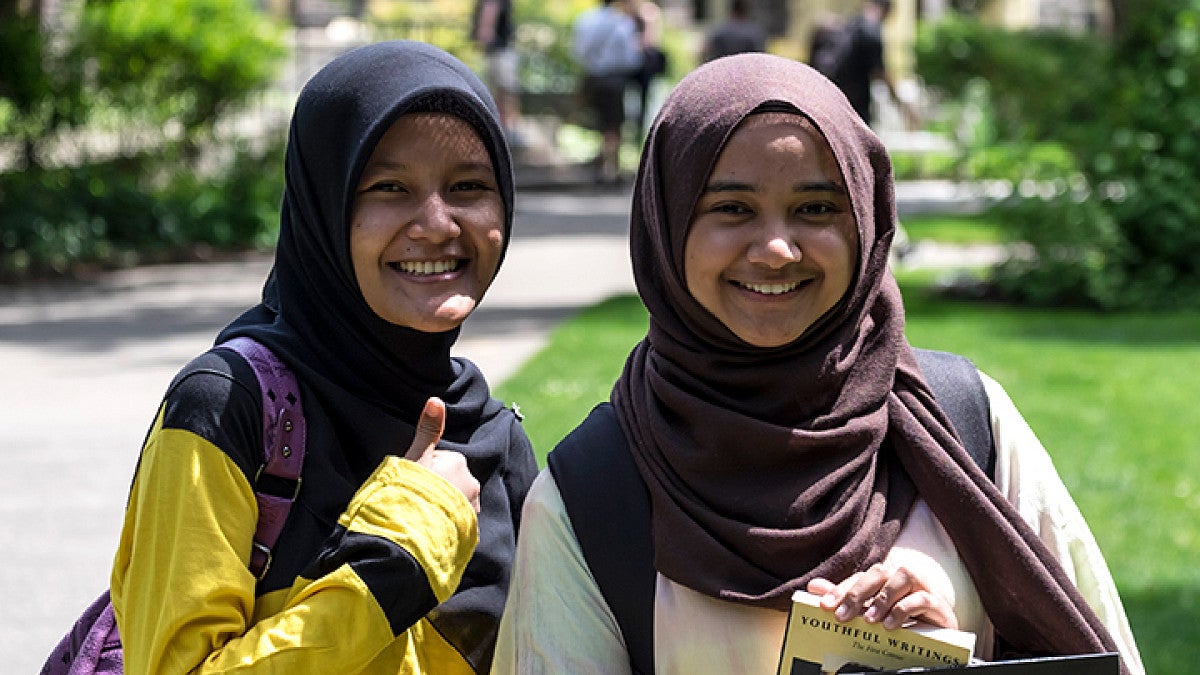 Two incoming students standing together.