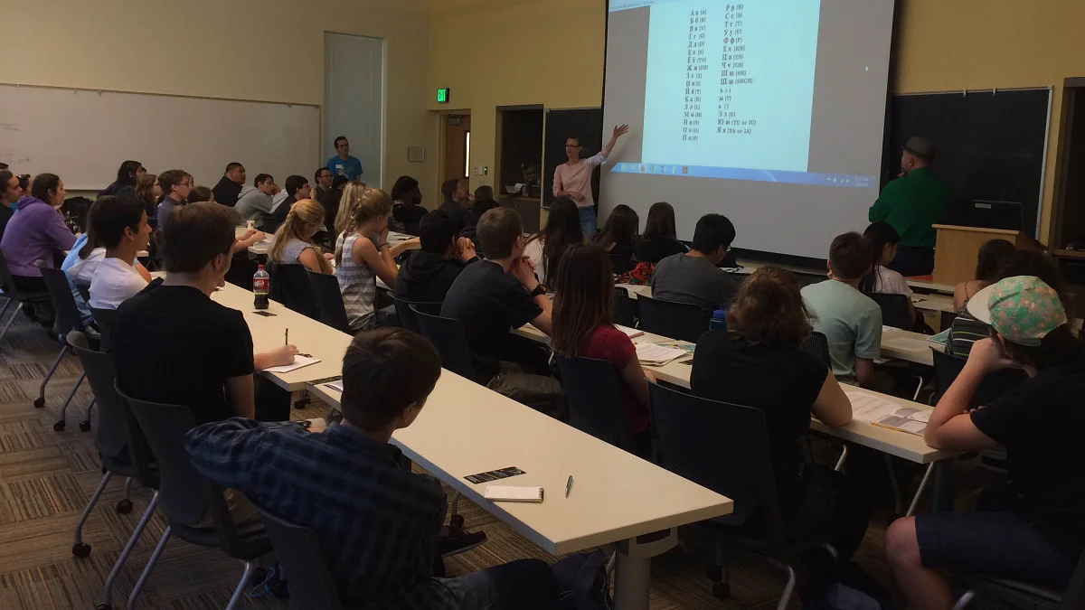 Lecture in a classroom filled with students attending a class.