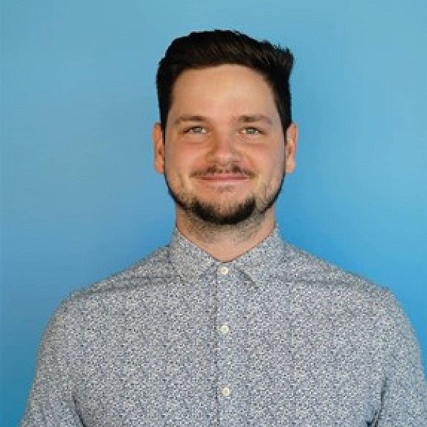 Portrait of Alec Cowan.