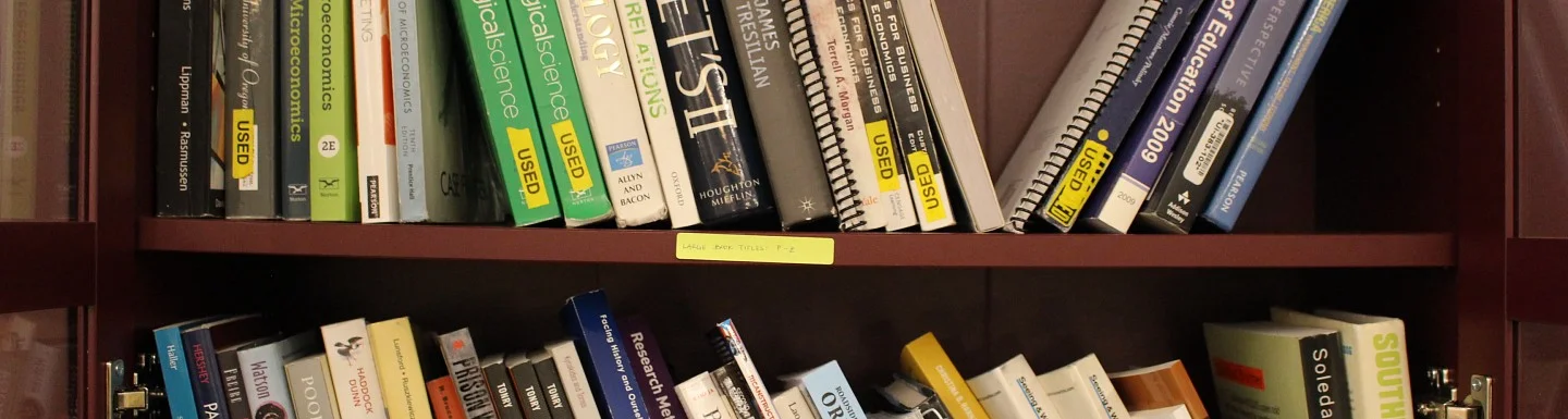 shelves of books from the resource library at cmae