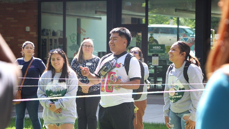 SLTer ,Adair, participates in the closing activity of the 2023 retreat. 