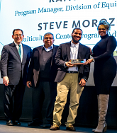 Photo of Kendaris Hill receiving their award