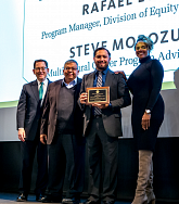 Photo of Rafael Lopez receiving their award