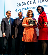 Photo of Rebecca Haggerwaite receiving their award