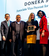 Photo of Suzanne Hanlon receiving their award