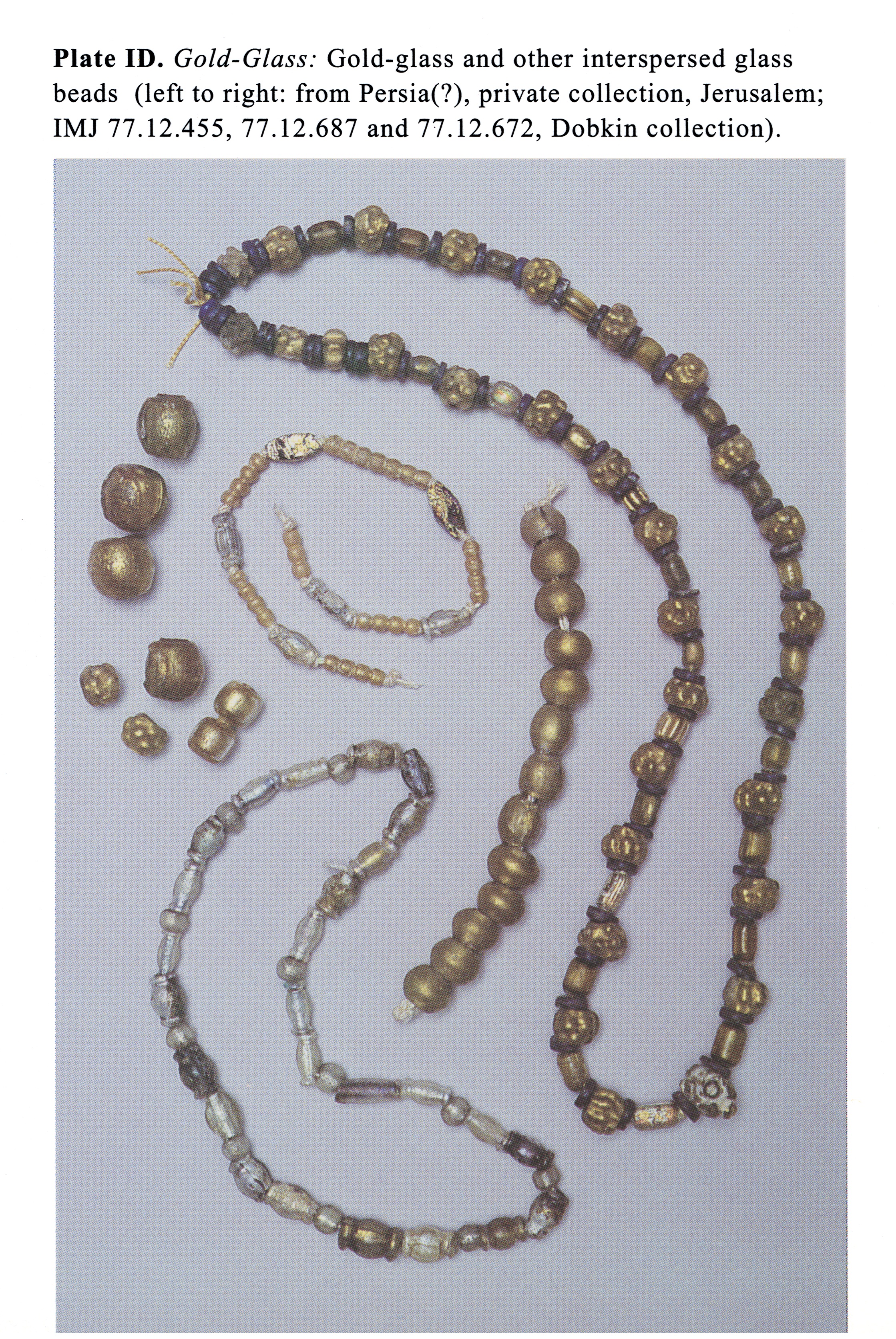 Plate ID Gold-Glass: Gold-glass and other interspersed glass beads (left to right: from Persia(?), private collection, Jerusalem; IMJ 77.12.455, 77.12.687 and 77.12.672, Dobkin collection).