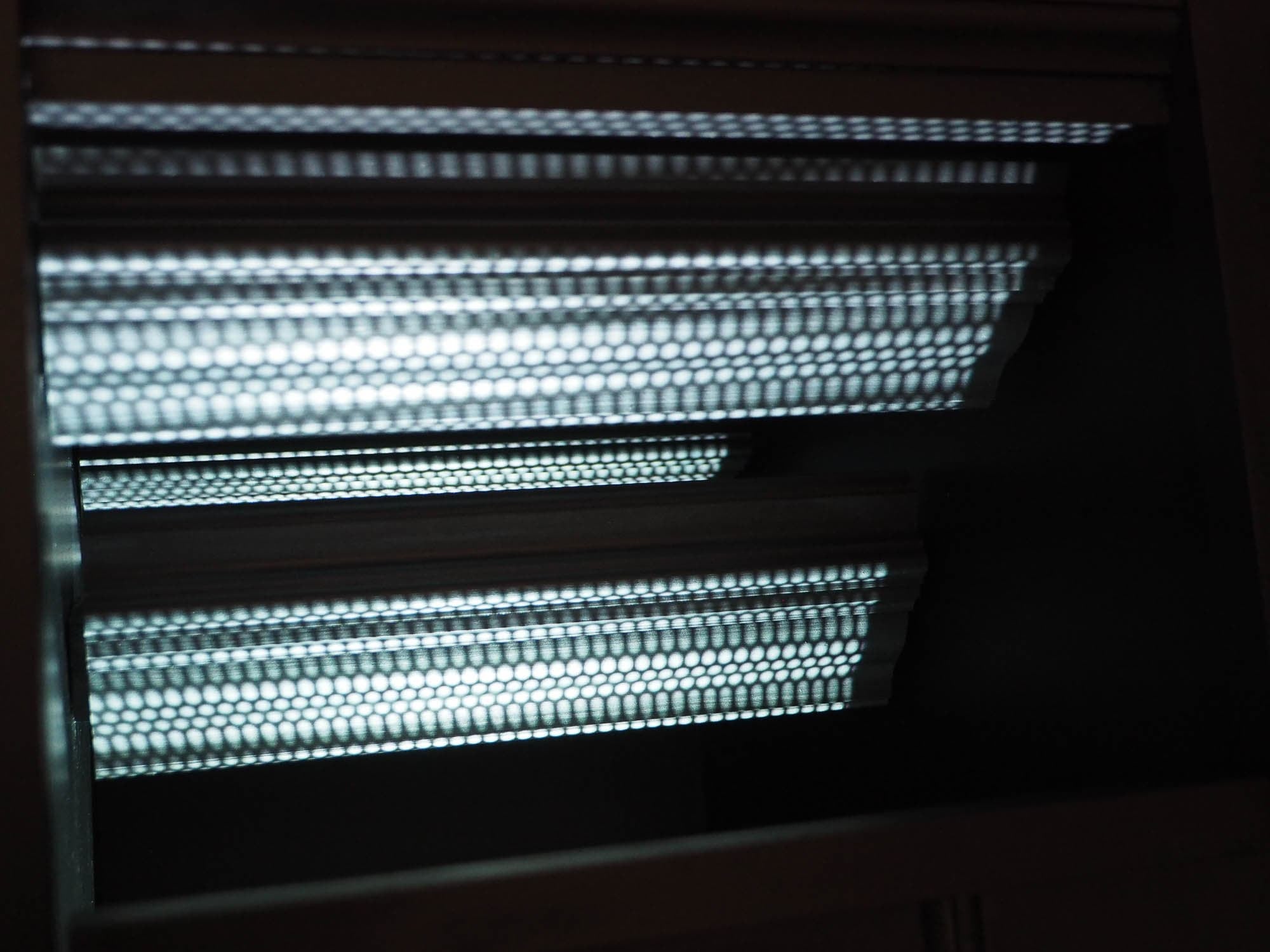 Grids of light in a dark space 