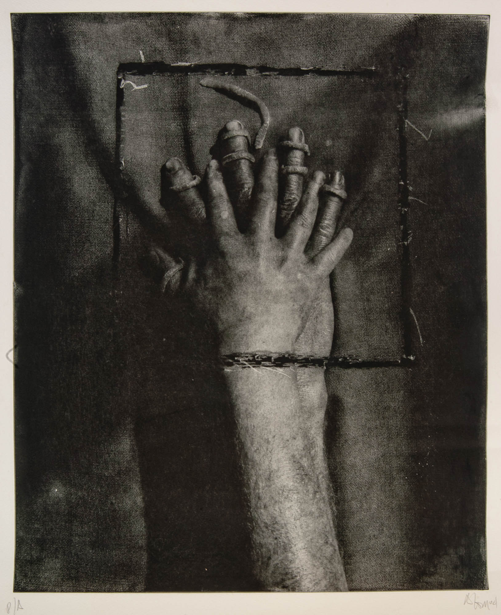 A close-up photograph of a hand with visible veins and textures, resting against a textured background. The hand appears to be part of a larger artwork, with a focus on the detailed rendering of the skin and fingers.