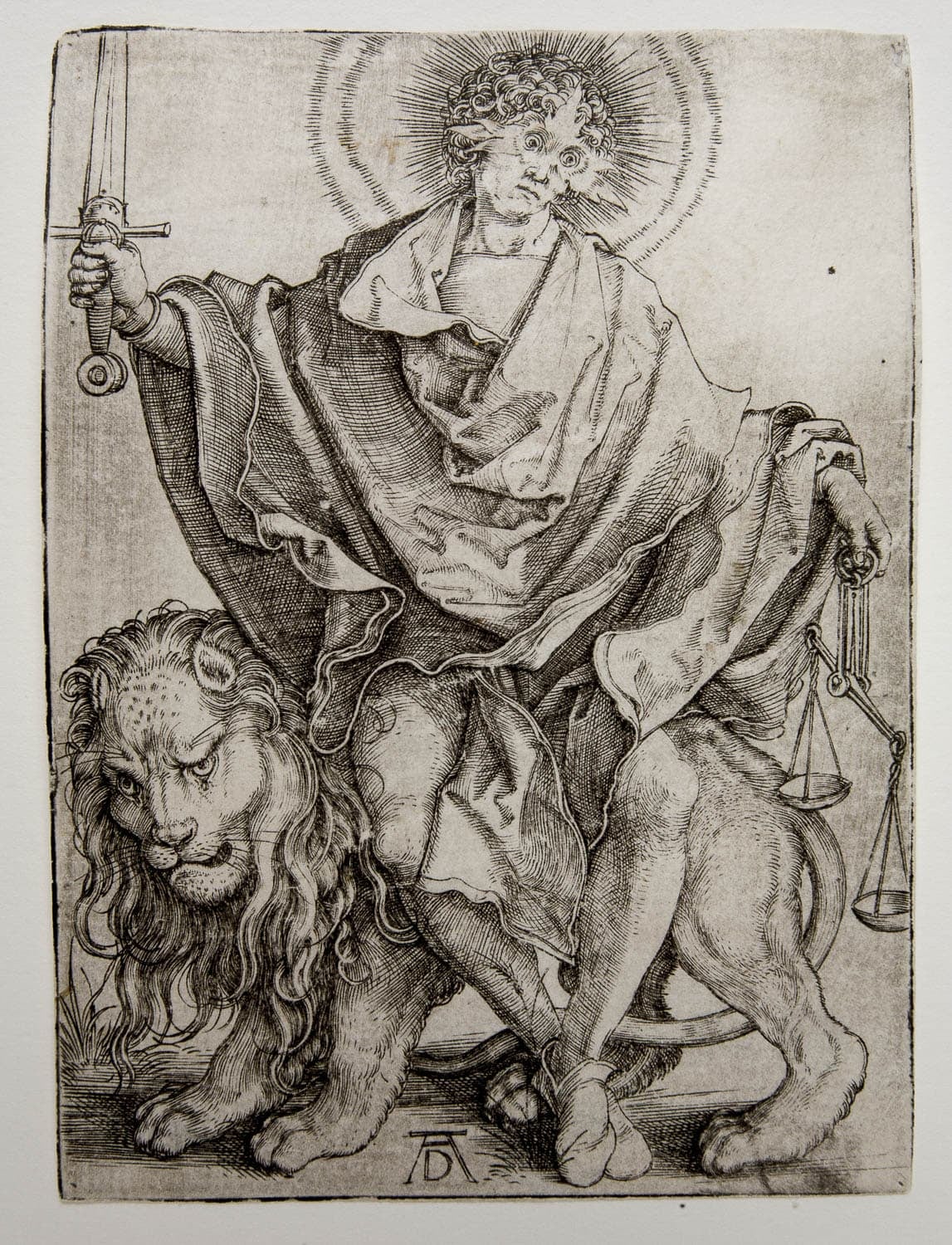 A detailed engraving of a figure with a radiant halo, holding a sword in one hand and a set of scales in the other, riding a lion. The figure has a majestic and divine presence.