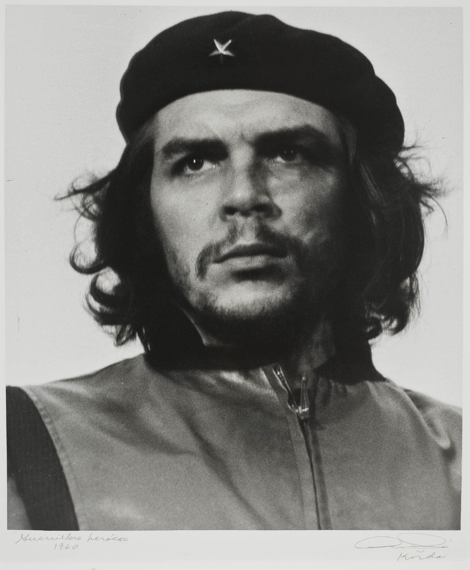 Iconic photograph of Che Guevara wearing a black beret and zippered jacket