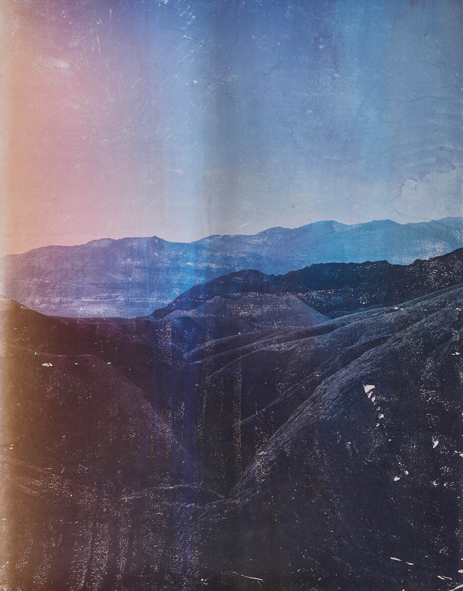 Color photograph of eroded black hills