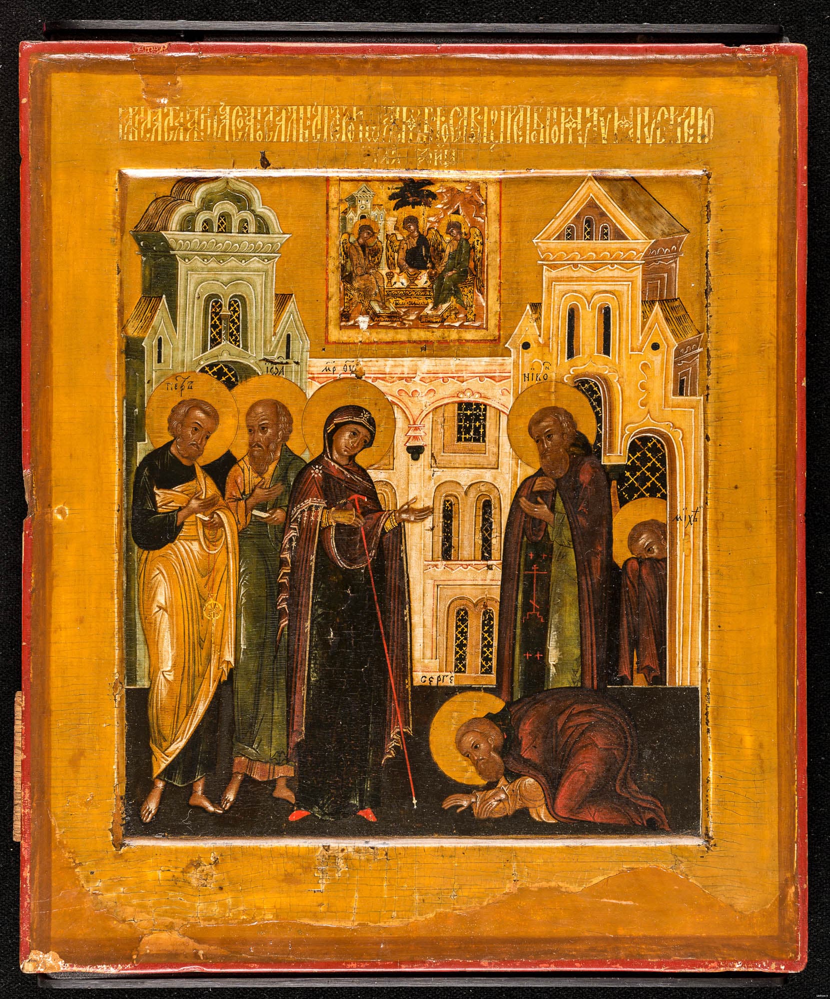 Religious icon of a woman standing on a street in front of an ornate building surrounded by 3 men with a fourth man kneeling on the ground in front of her. All figures are haloed.