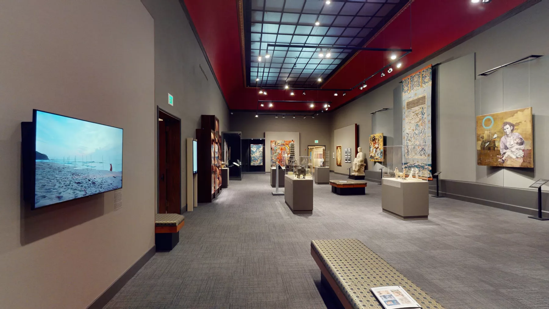 Gallery space with red ceiling
