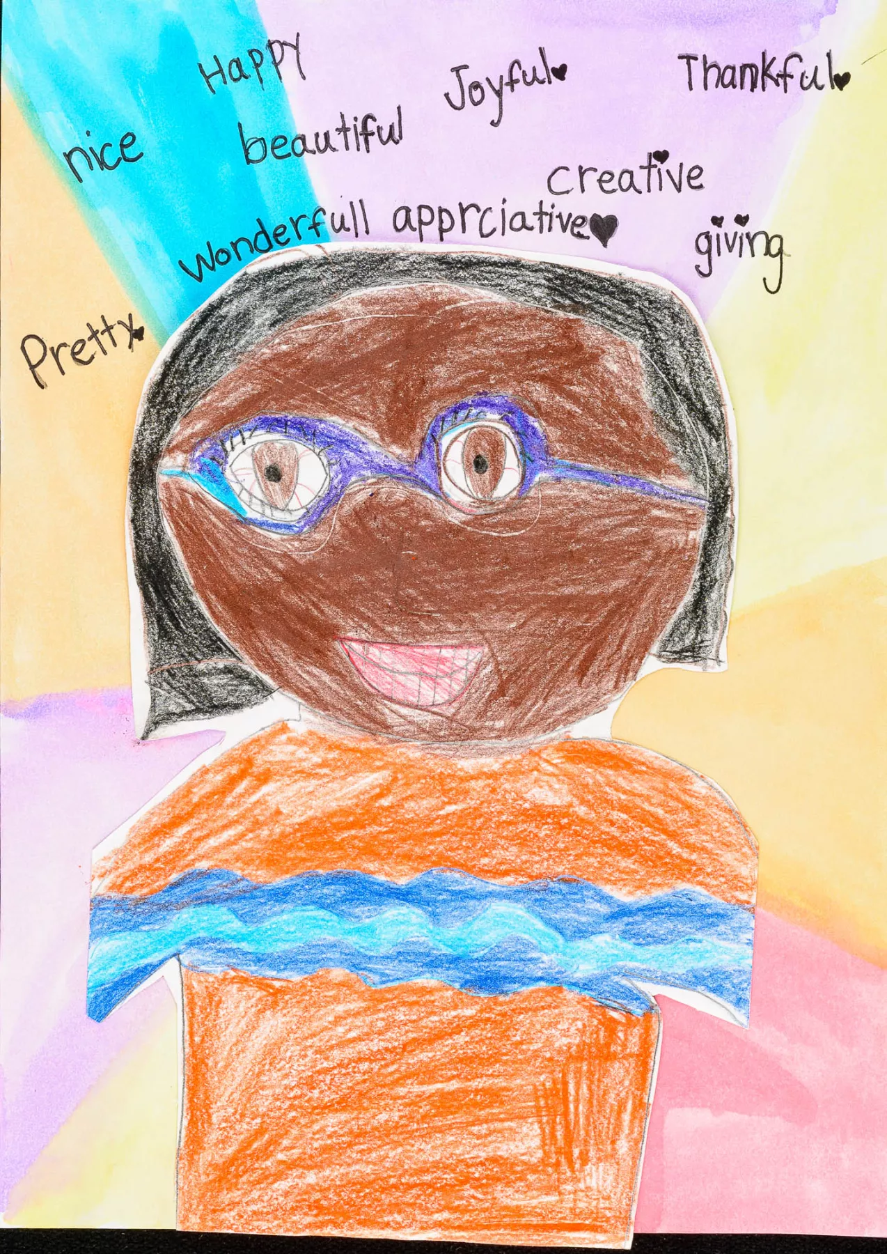 Child’s drawing of a smiling dark-skinned person wearing blue glasses and an orange shirt with inspirational words written around their head