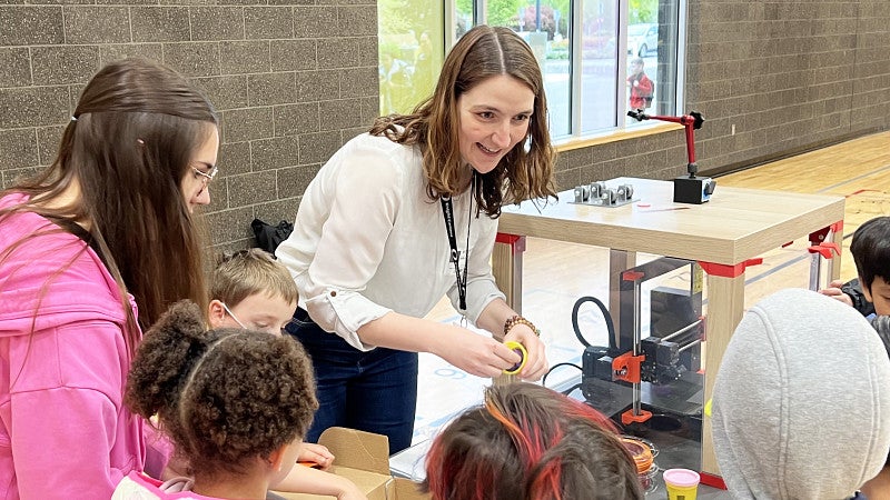 A person explains science to kids