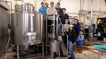 Brewing student on brew day