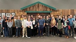 LCC, UCC, UO students and staff in the Heritage Center at HP