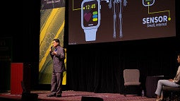 Ghee Ong presenting on stage at science knight out