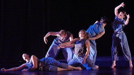 college dance troupe in blue costumes