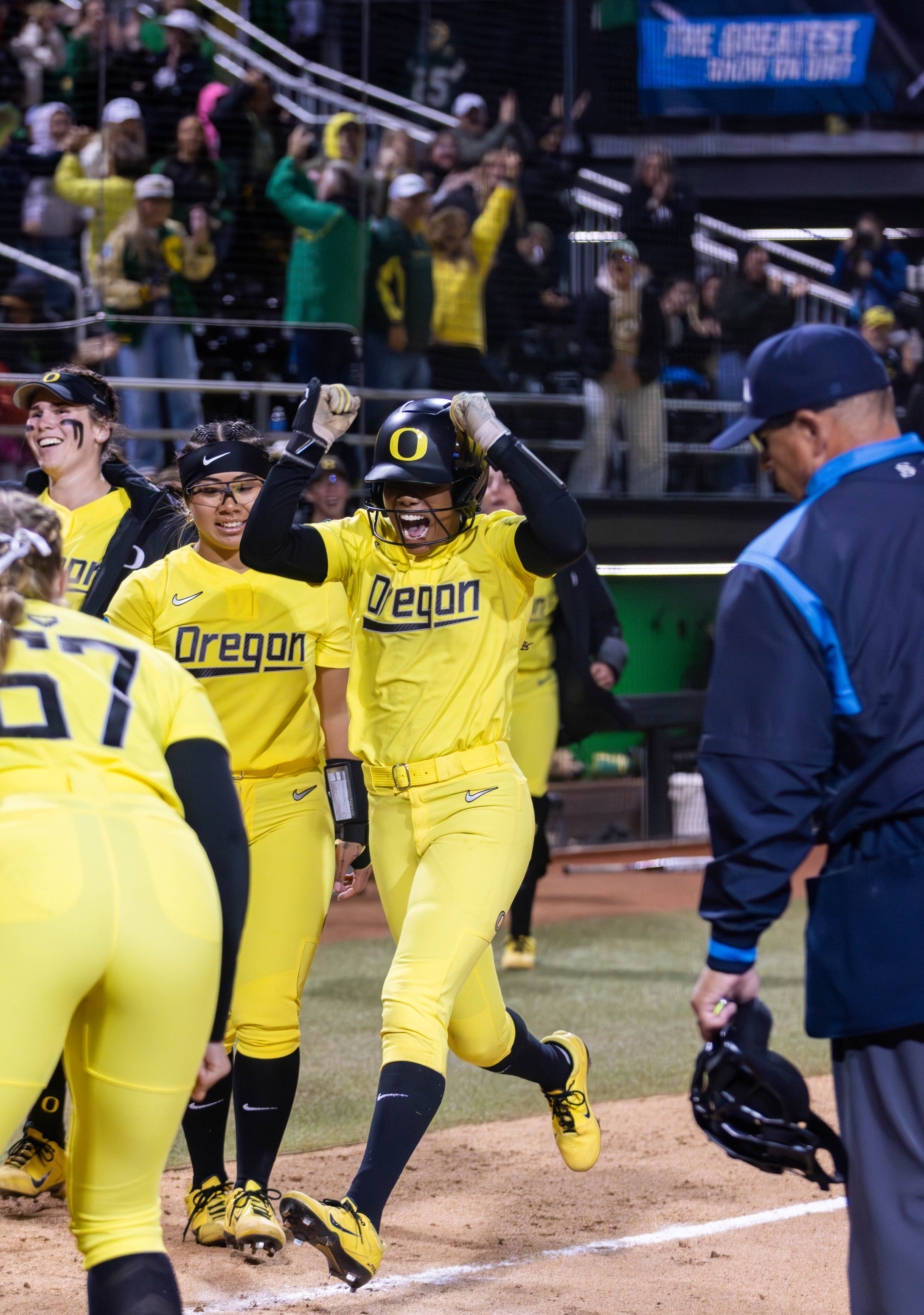 Oregon center fielder Ayanna Shaw celebrates as she crosses home after hitting a grand slam in the Ducks 5-1 win over Idaho State at the Eugene Regional